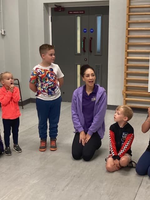Holiday club children smiling together at Nellie B's